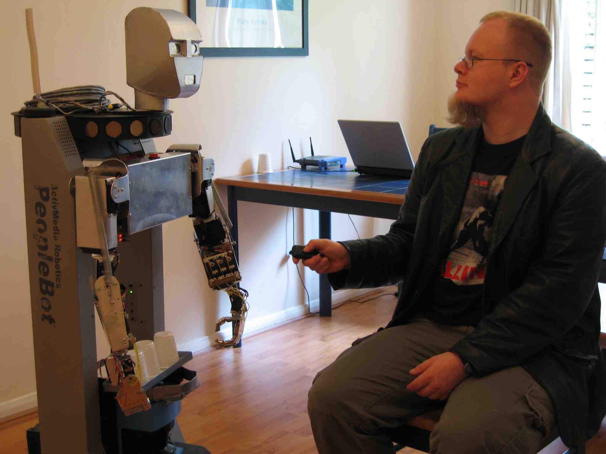 A Humanoid robot approaches a human
