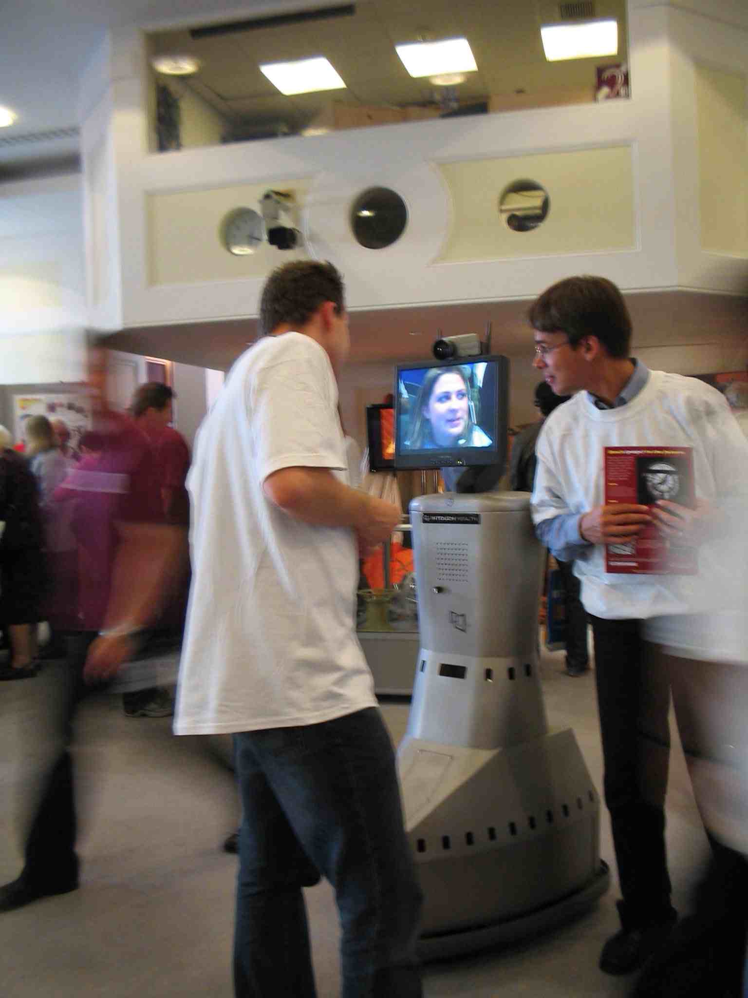 The Imperial Robot being persuaded to visit the Sodarace stall