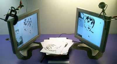 two screens facing one another, with similar portraits on each