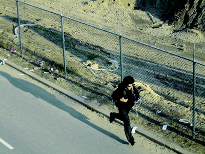a player runs down a street