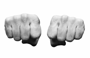 Two fists held out towards the viewer