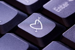 a computer key labelled with a heart