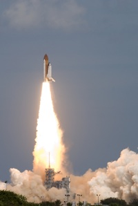 the space shuttle blasting off